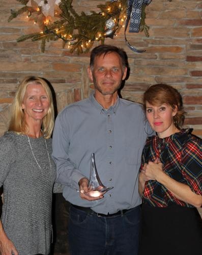 Bill Meagher received "The Greater Good Award." Pictured from left to right are his wife, Kathy Meagher, Bill Meagher, and Jennifer Walsh of TGCC.