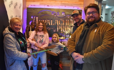 Ribbon Cutting at Appalachian Print Studio, Friendsville, Photo from left to right: Patty Manown Mash, Kassy Cosner, Kassy's daughter and husband, and Connor Norman.