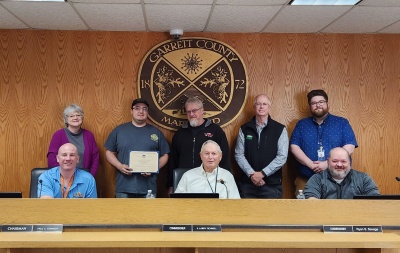 Photo (left to right):  Sitting: Commissioners Paul Edwards, Larry Tichnell, and Ryan Savage Standing: Business Development Manager Kim Durst, Dalton Smith, owner of D's Eats, Bobby Smith, Chamber of Commerce President Andrew Fike, and Business Development Specialist Connor Norman