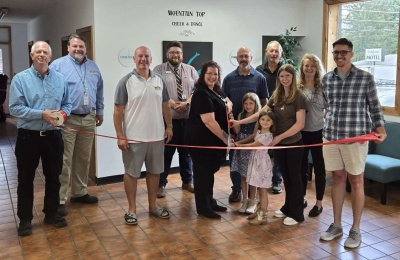 Photo (l-r): Garrett County Chamber President Andrew Fike, Director of Community Development Steve Kelley, County Commissioner Paul Edwards, Business Development Specialist Connor Norman, Owner Jennifer Lee and her family (Jennifer, Timothy Lee, Sadie Lee, Madalyn Lee, Amelia Lee), Commissioner Larry Tichnell, Instructor Christie Reckart, and Oakland Mayor Andrew Sauder