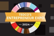 The words "TEDCO's Entrepreneur Expo 2024" in white text on a gold ribbon background surrounded by a circle of multiple colors, all on a black background