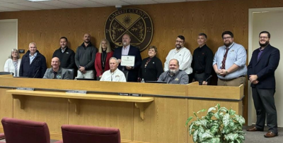 Men & women celebrating First United Bank & Trust's 125 years of community service