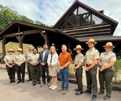 Maryland Park Service Director Angela Crenshaw, Department of Natural Resources Sec. Josh Kurtz, Comptroller Brooke Lierman, and Maryland Senate President Bill Ferguson celebrated the dedication of Savage Highlands State Park with Maryland Park Service staff on Aug. 22.